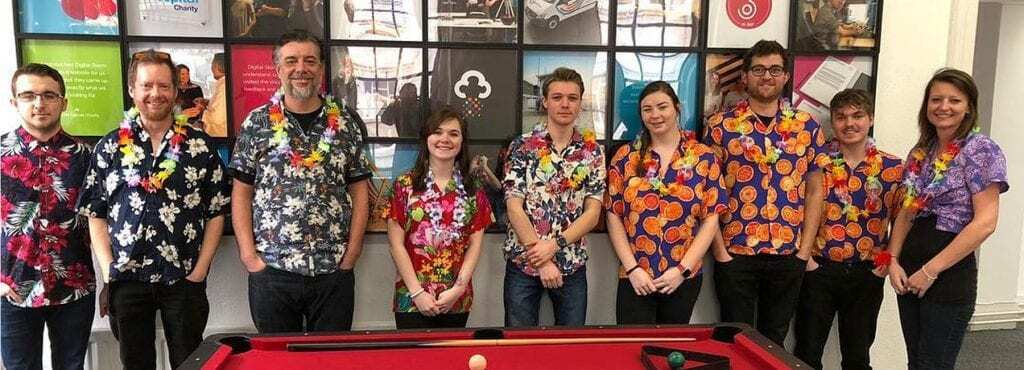 Digital Storm team sporting Hawaiian shirts