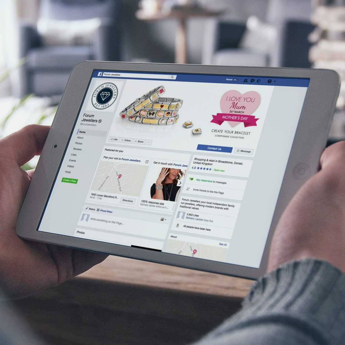 person looking at Forum jewellers facebook page on an iPad