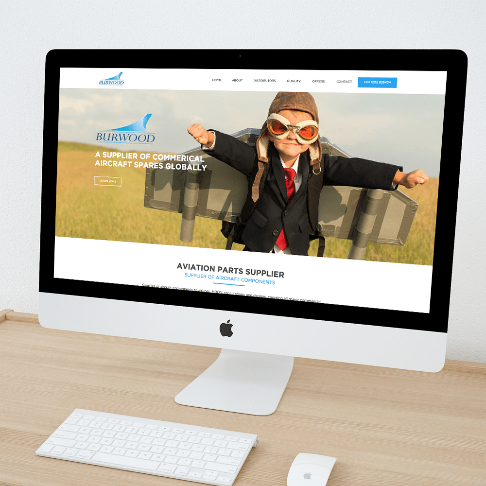 Burwood Mac on a wooden desk